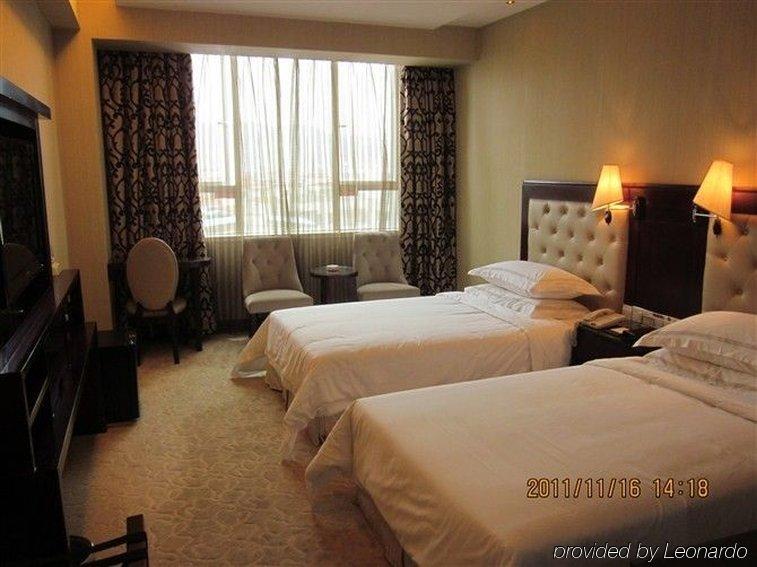 Vienna Hotel In Pinghu Square Shenzhen Quarto foto